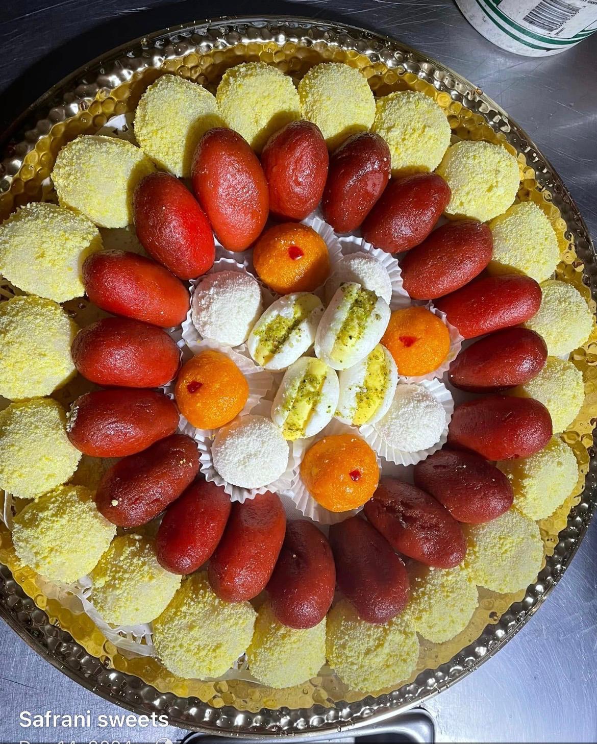 Mixed sweets platter with gulab jamun, kheer toast and chum chum